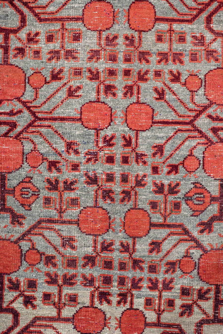5' x 11' one-of-a-kind handmade vintage Khotan rug. Color palette: coral, ivory, slate, burgundy, rose, charcoal, terracotta