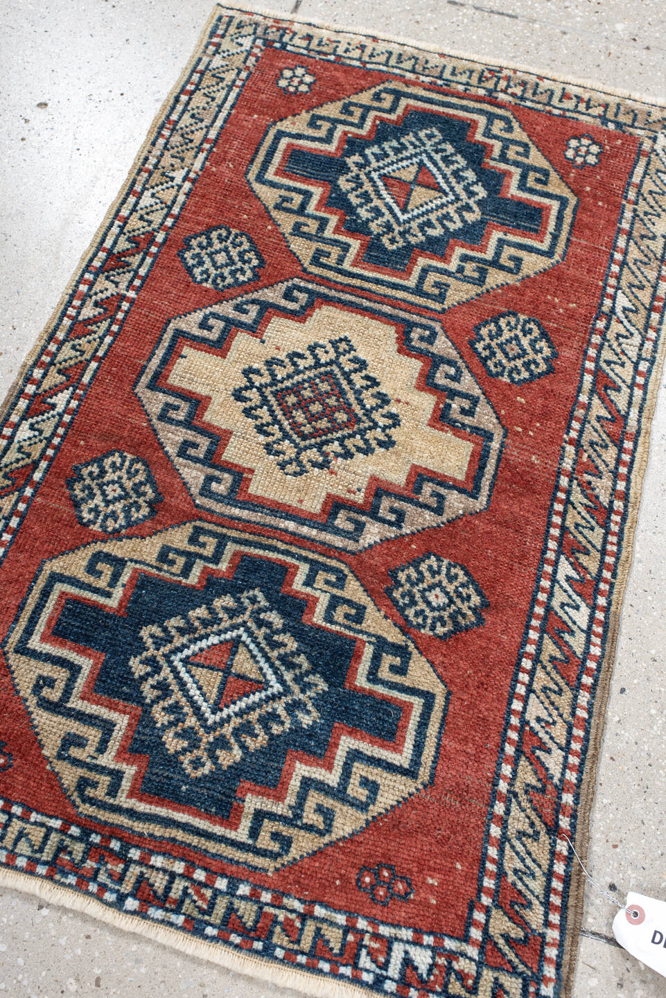 2' x 3' one-of-a-kind handmade vintage Anatolian small size rug. Color palette: rust, ivory, navy, crimson, terracotta