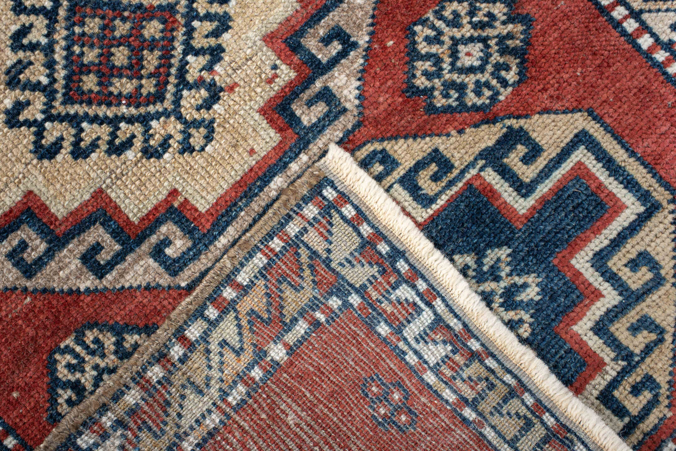 2' x 3' one-of-a-kind handmade vintage Anatolian small size rug. Color palette: rust, ivory, navy, crimson, terracotta