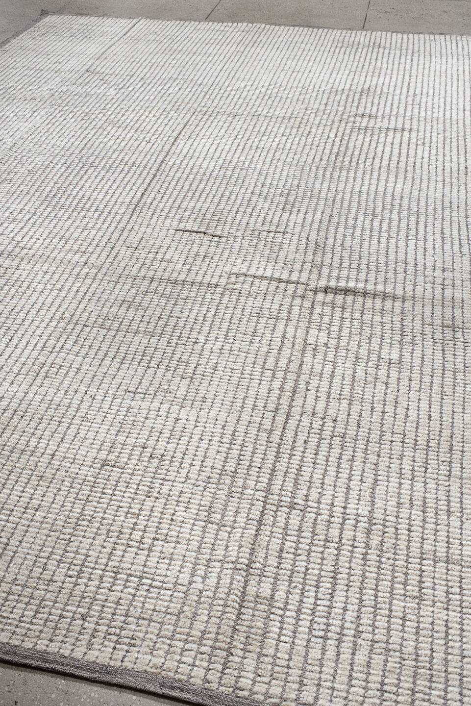 9' x 12' one-of-a-kind handmade vintage Tulu large size rug. Color palette: light gray, off-white, gray, dark gray