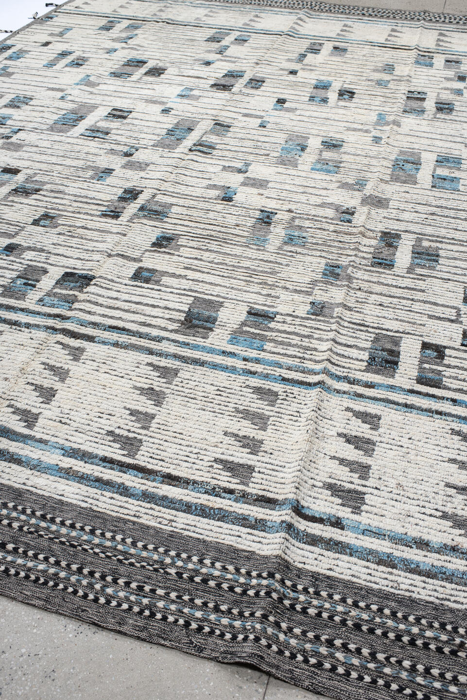 10' x 13' one-of-a-kind handmade vintage Tulu large size rug. Color palette: gray, off-white, light gray, black, light blue