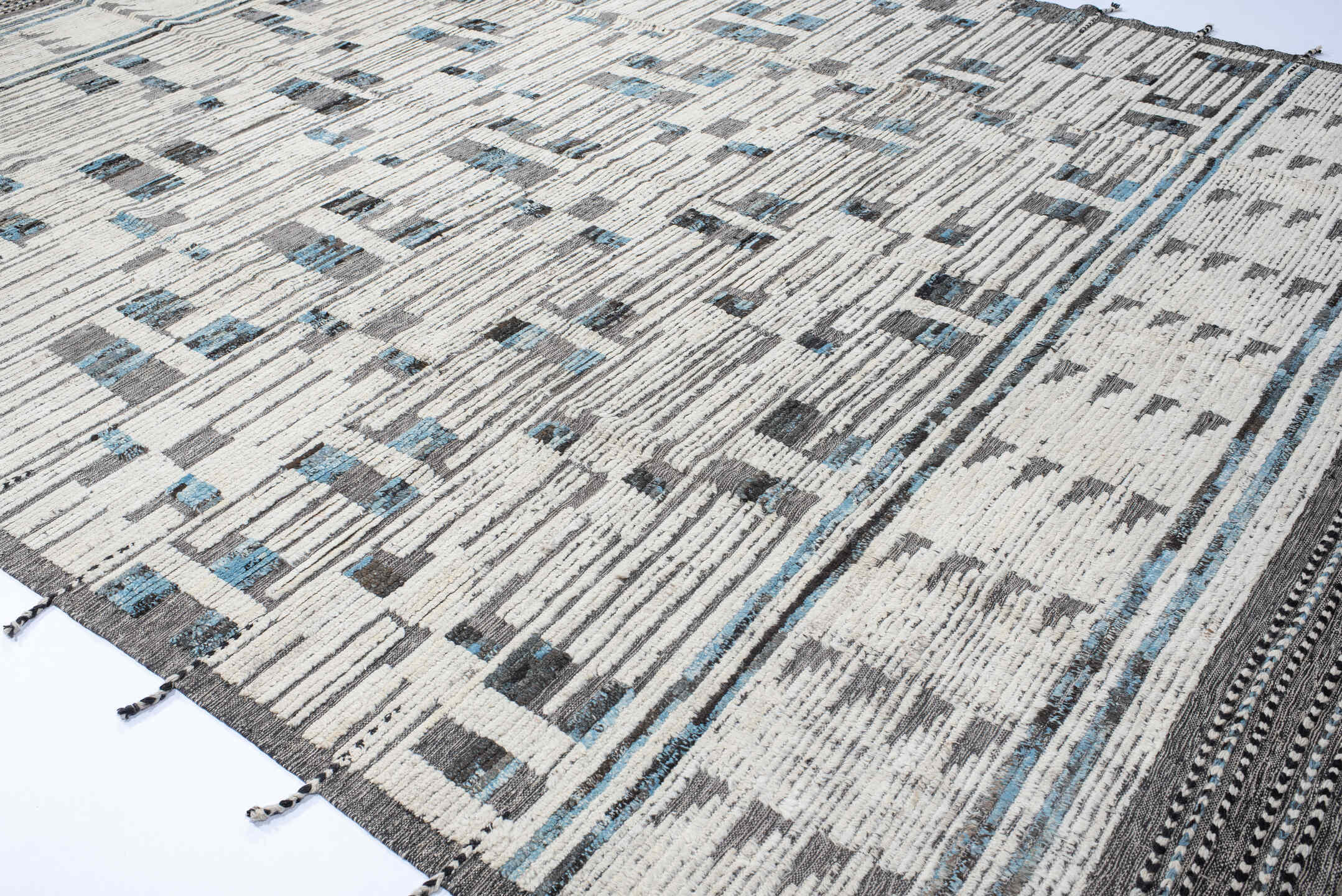 10' x 13' one-of-a-kind handmade vintage Tulu large size rug. Color palette: gray, off-white, light gray, black, light blue