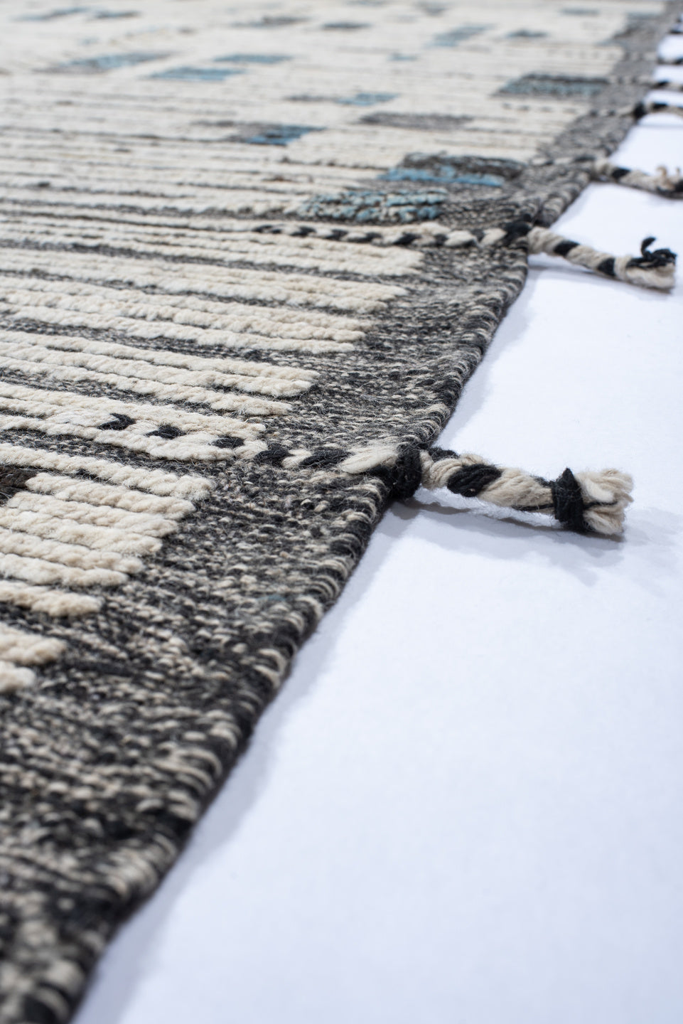 10' x 13' one-of-a-kind handmade vintage Tulu large size rug. Color palette: gray, off-white, light gray, black, light blue