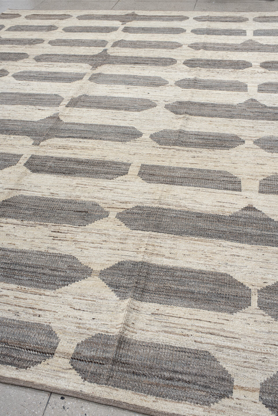 10' x 13' one-of-a-kind handmade vintage Tulu large size rug. Color palette: gray, off-white, light gray, dark gray