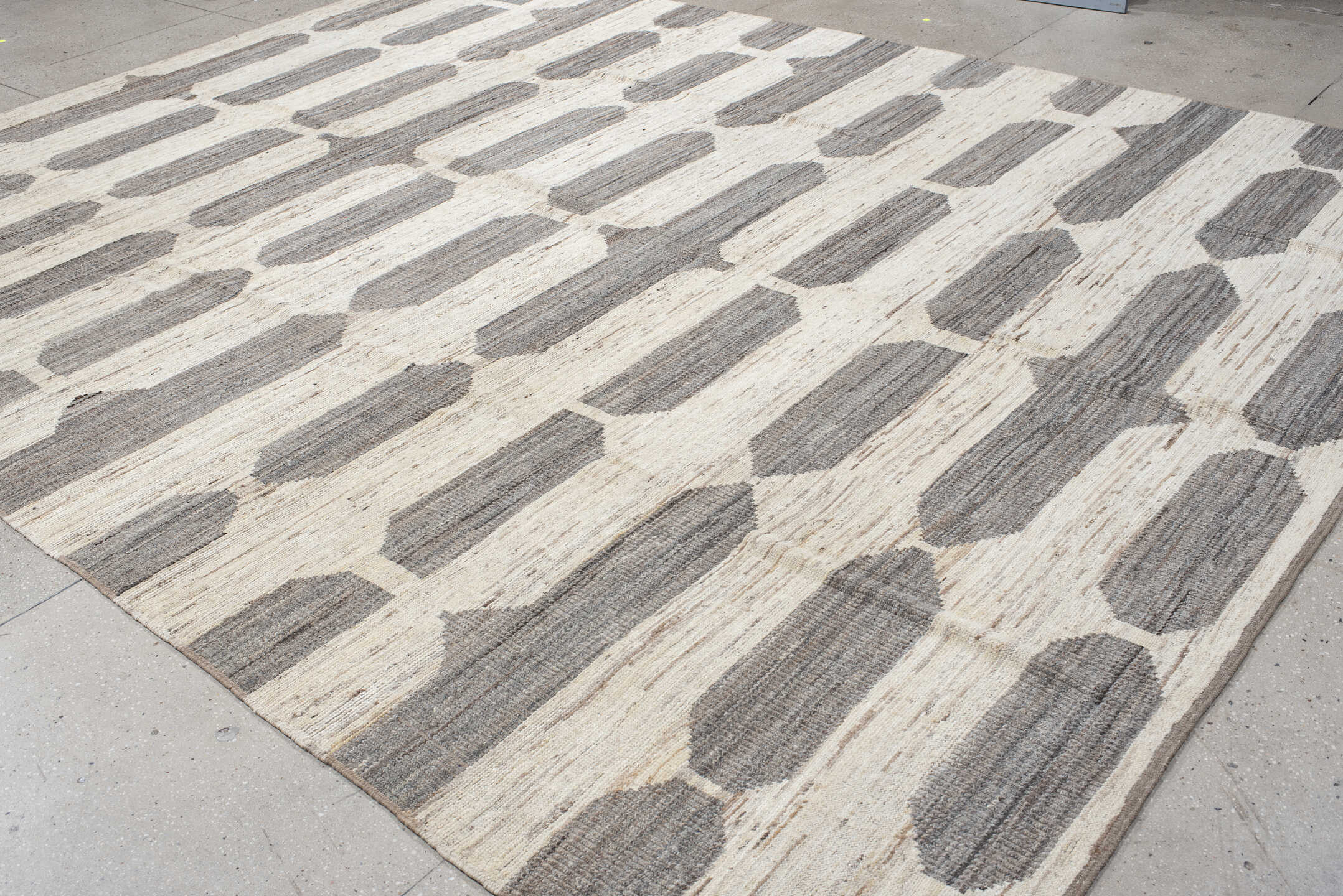 10' x 13' one-of-a-kind handmade vintage Tulu large size rug. Color palette: gray, off-white, light gray, dark gray