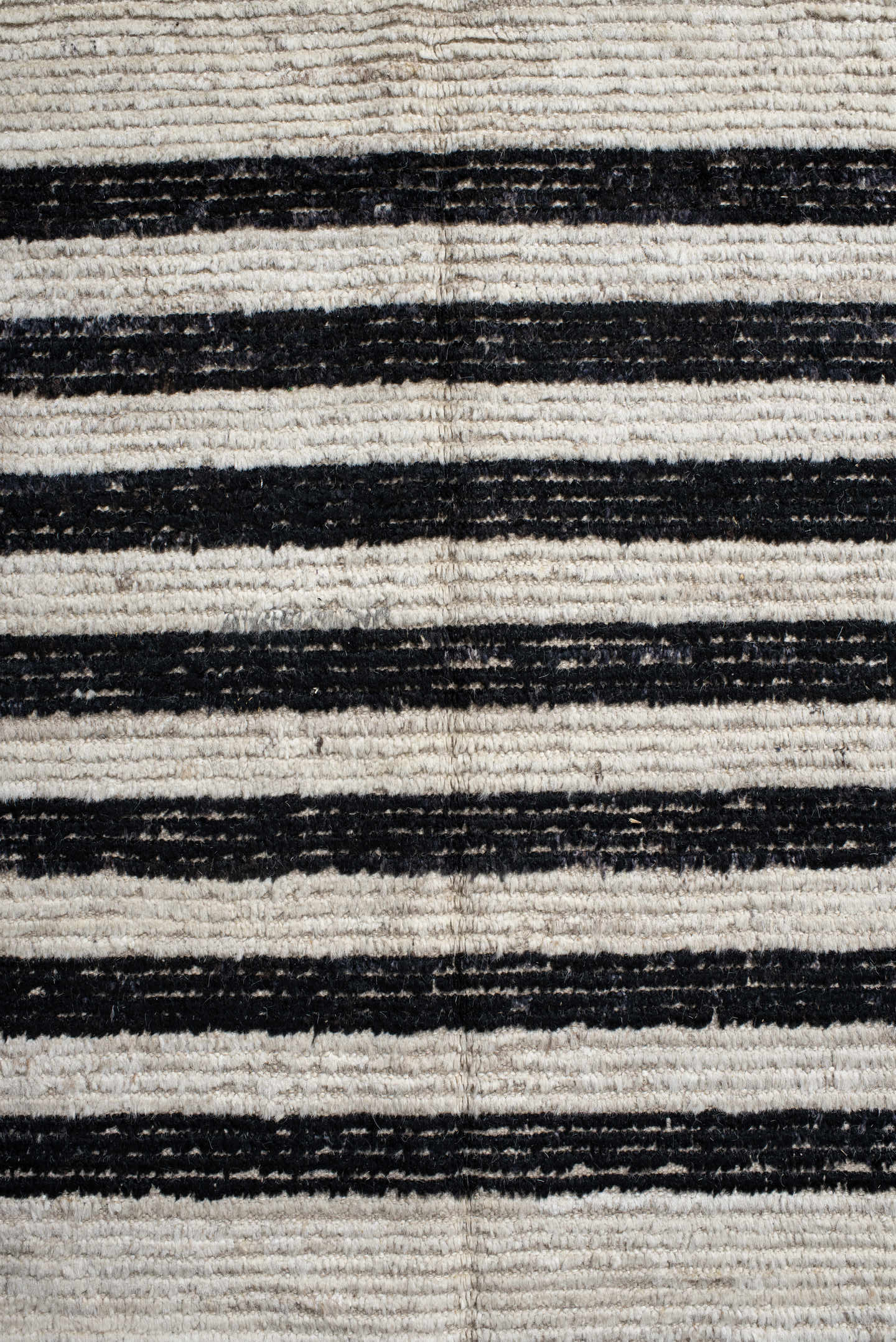 6' x 9' one-of-a-kind handmade vintage Tulu medium size rug. Color palette: ivory, charcoal, beige, gray, black