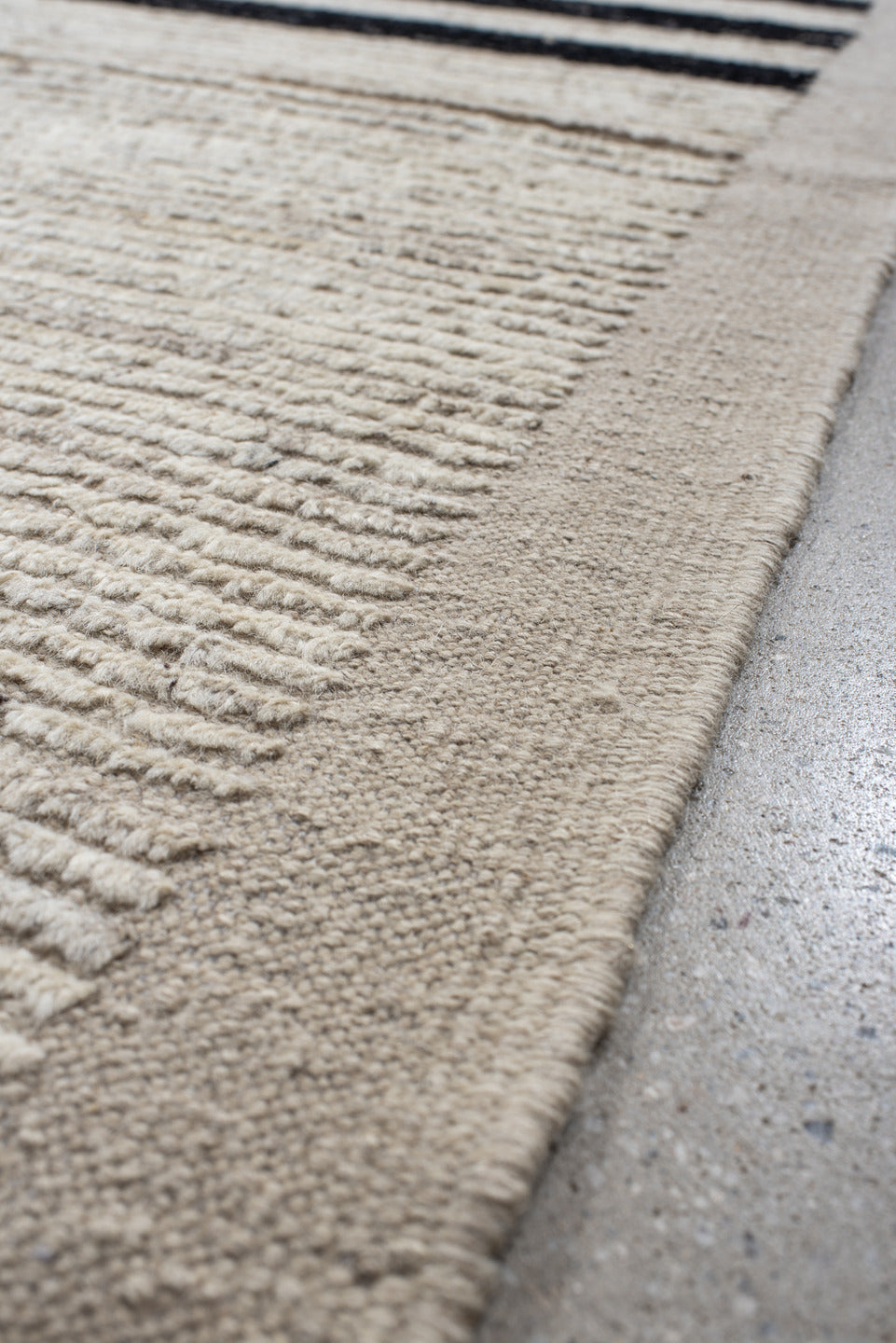 6' x 9' one-of-a-kind handmade vintage Tulu medium size rug. Color palette: ivory, charcoal, beige, gray, black