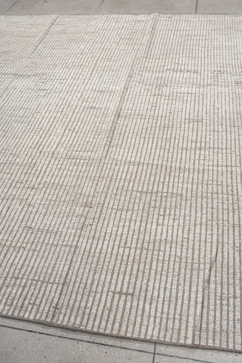 8' x 9' one-of-a-kind handmade vintage Tulu rug. Color palette: gray, off-white, light gray, pink, seashell, floral white