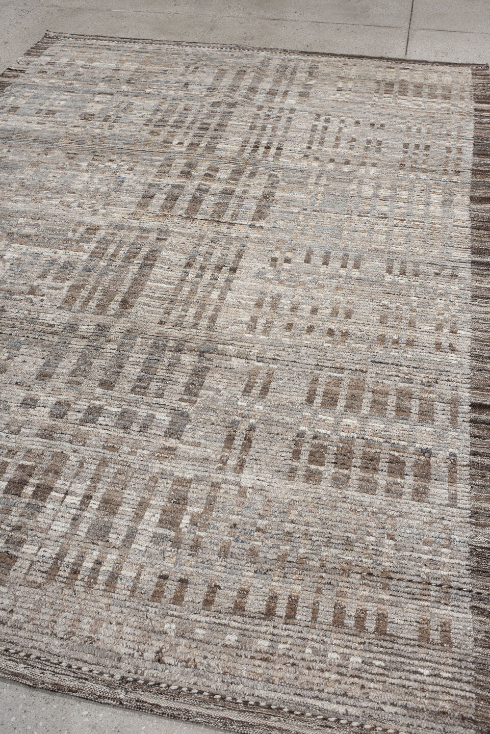 6' x 9' one-of-a-kind handmade vintage Tulu medium size rug. Color palette: ivory, taupe, beige, brown, gray, cream