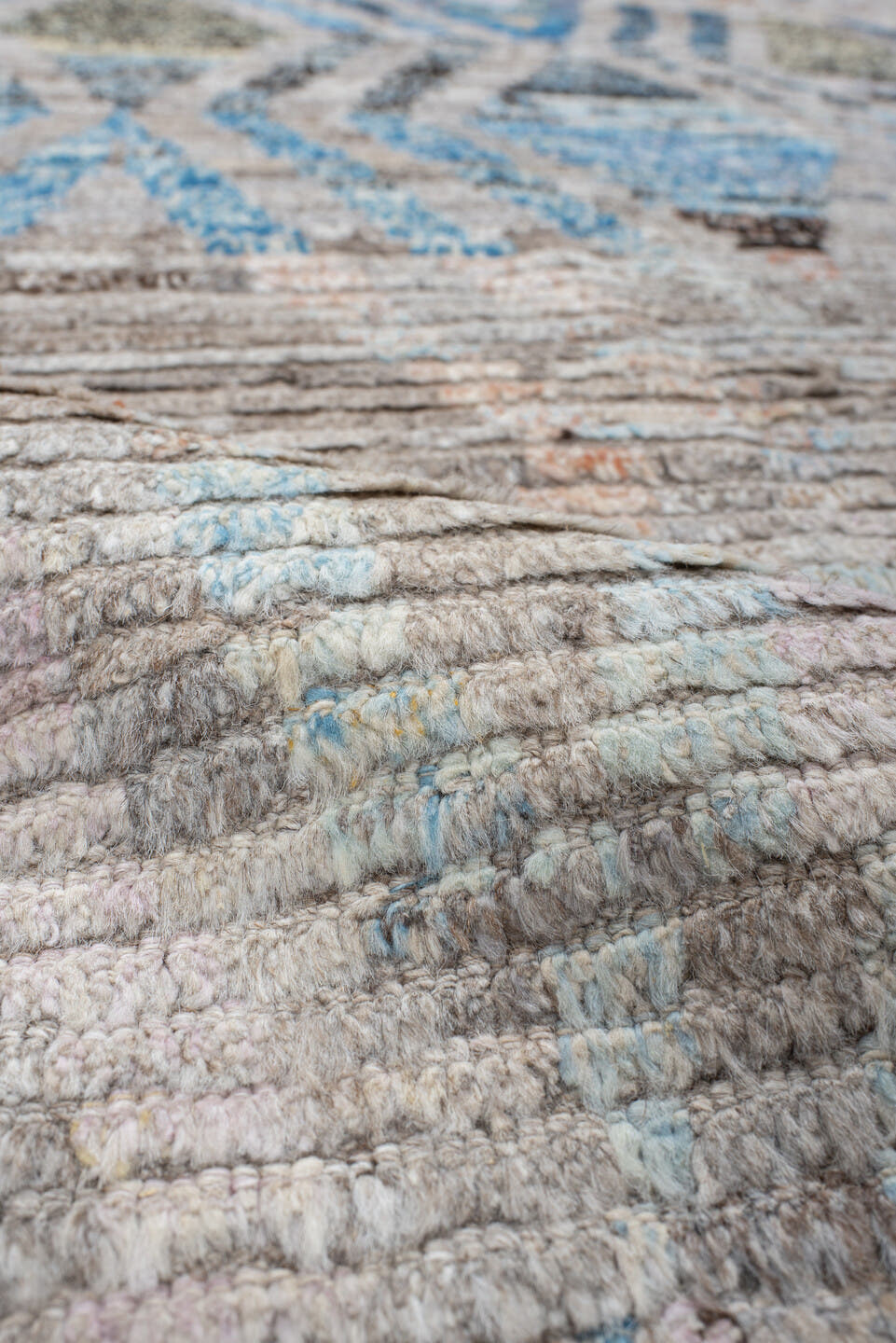 8' x 12' one-of-a-kind handmade vintage Tulu large size rug. Color palette: ivory, sky blue, taupe, charcoal, peach, gray