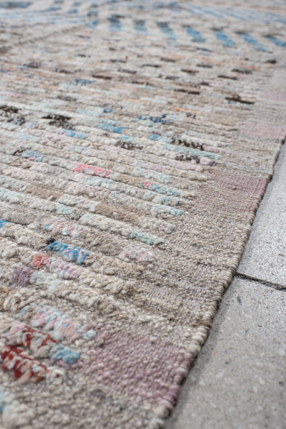 8' x 12' one-of-a-kind handmade vintage Tulu large size rug. Color palette: ivory, sky blue, taupe, charcoal, peach, gray