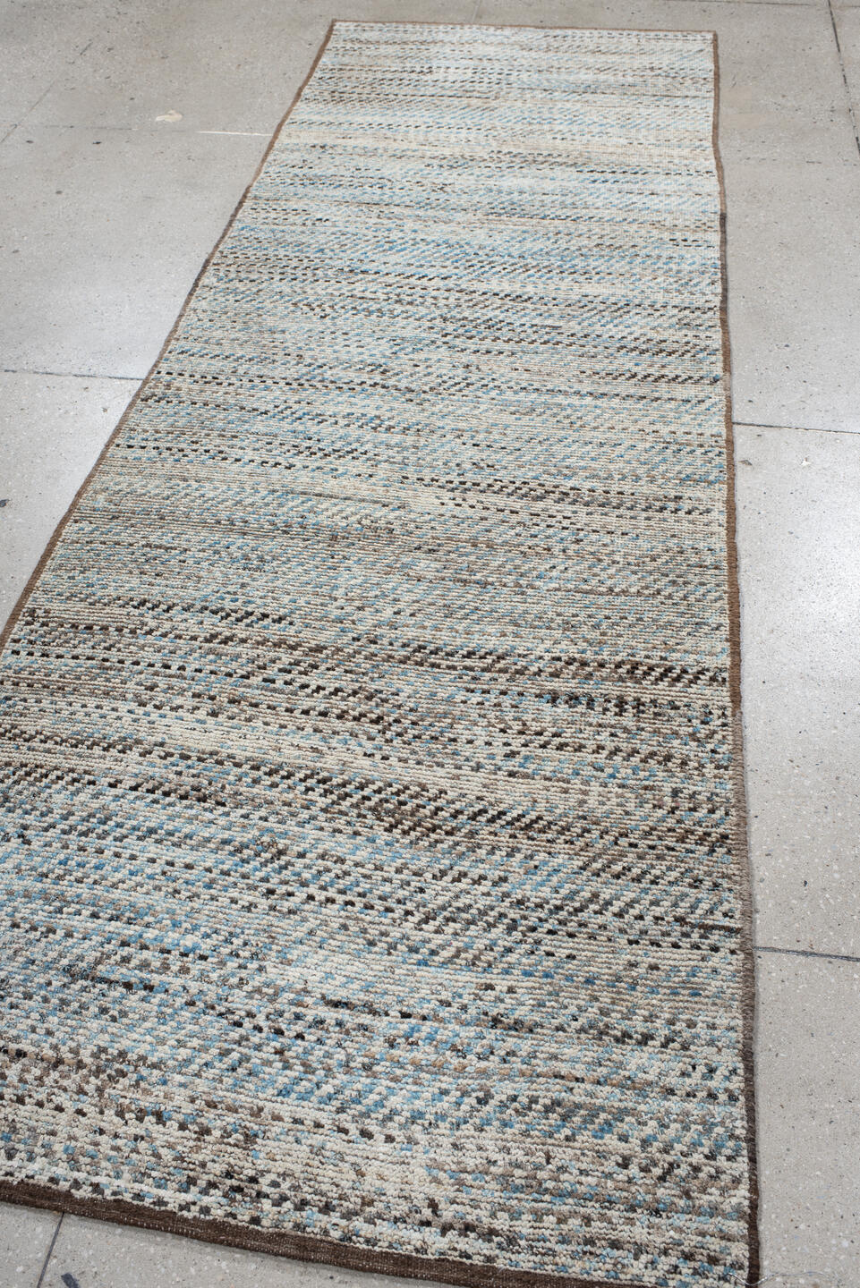 3' x 9' one-of-a-kind handmade vintage Tulu runner rug. Color palette: ivory, taupe, brown, pale_blue, charcoal, beige, gray