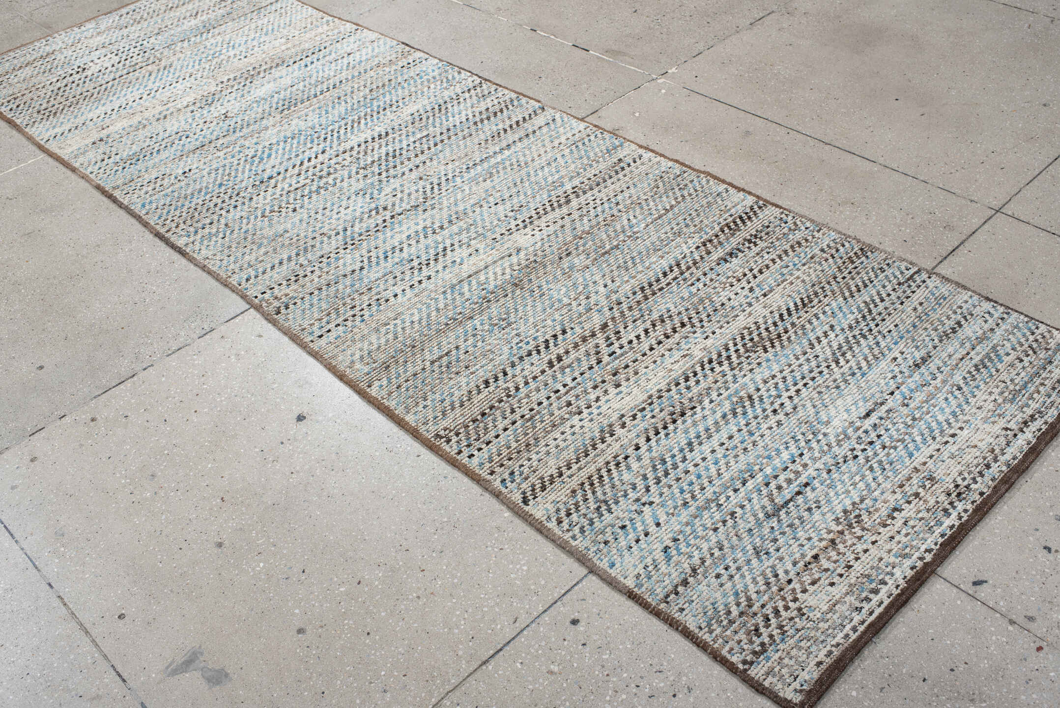 3' x 9' one-of-a-kind handmade vintage Tulu runner rug. Color palette: ivory, taupe, brown, pale_blue, charcoal, beige, gray