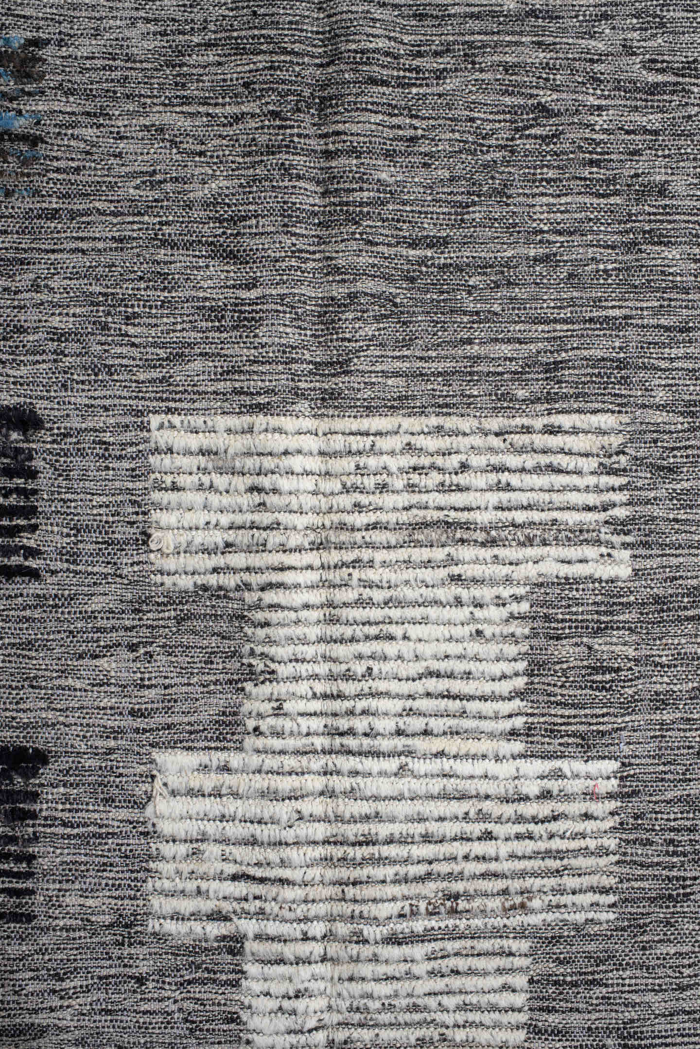 7' x 9' one-of-a-kind handmade vintage Tulu rug. Color palette: gray, charcoal, ivory, turquoise, taupe, black, teal, beige