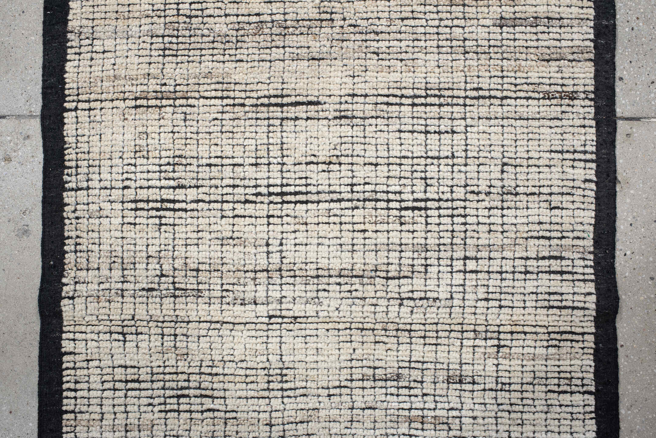 3' x 8' one-of-a-kind handmade vintage Tulu runner rug. Color palette: ivory, charcoal, black, cream, gray