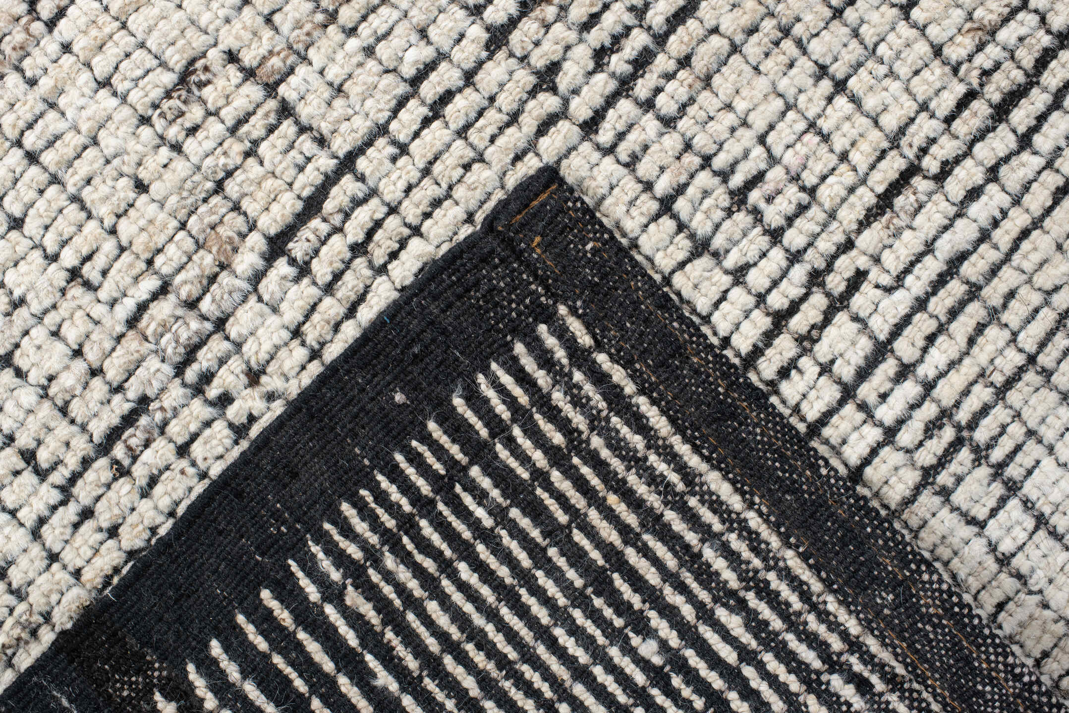 3' x 8' one-of-a-kind handmade vintage Tulu runner rug. Color palette: ivory, charcoal, black, cream, gray