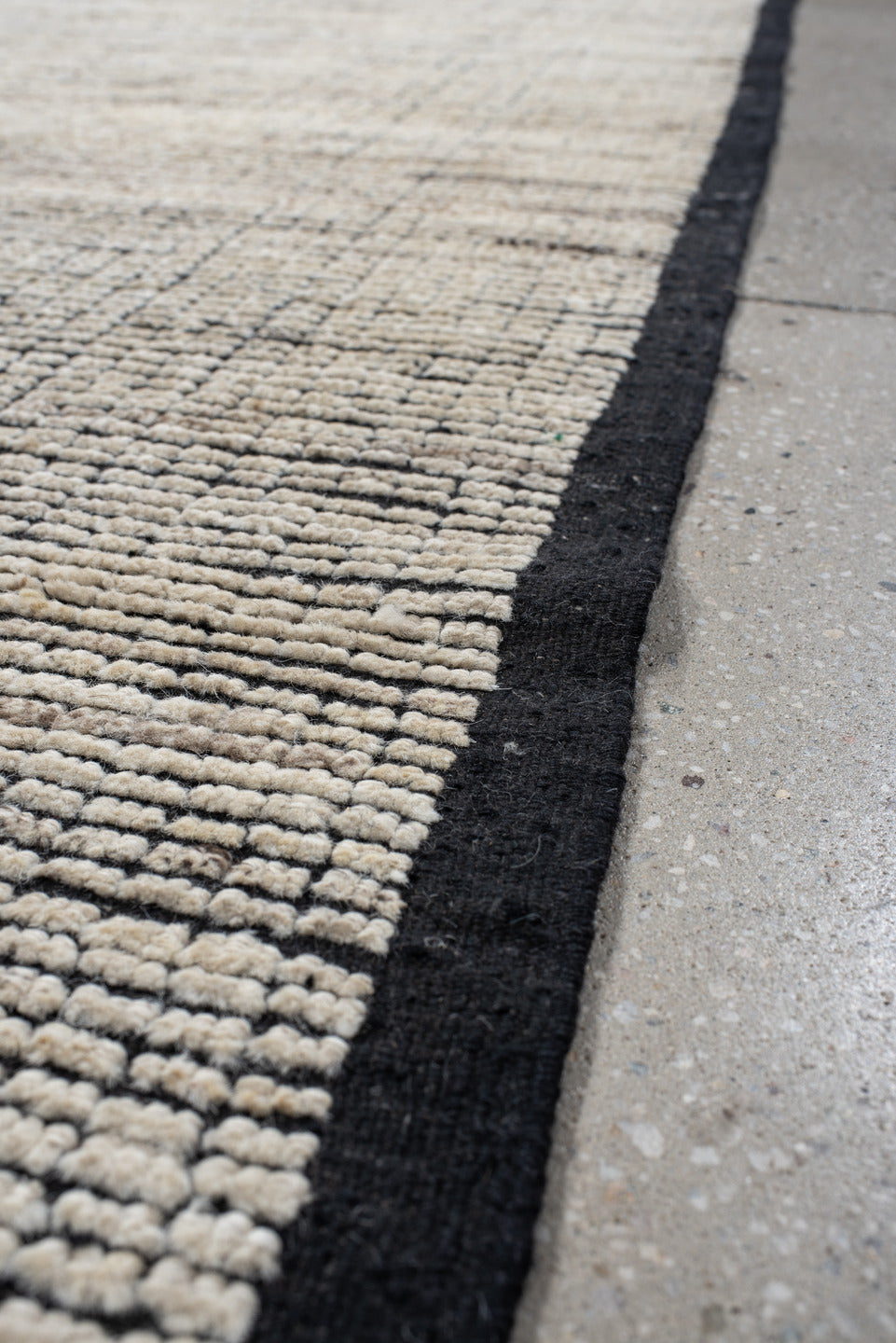 3' x 8' one-of-a-kind handmade vintage Tulu runner rug. Color palette: ivory, charcoal, black, cream, gray