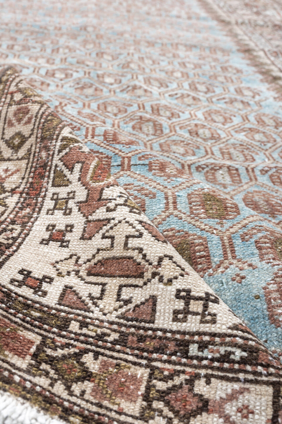 4' x 9' one-of-a-kind handmade antique Malayer runner rug. Color palette: ivory, sky blue, taupe, rust, brown, camel