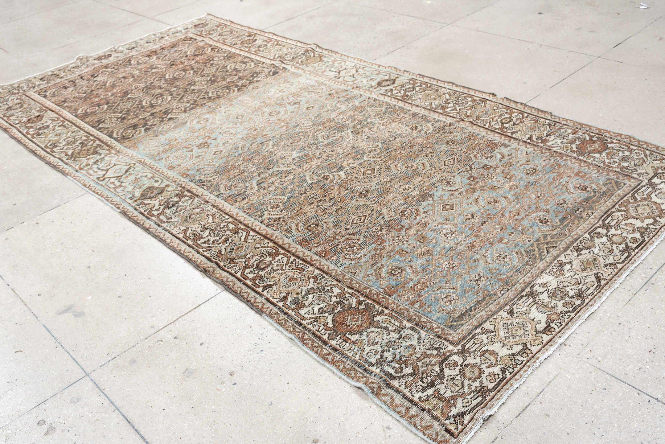 5' x 10' one-of-a-kind handmade vintage Malayer rug. Color palette: ivory, sky blue, taupe, brown, camel, slate, rust