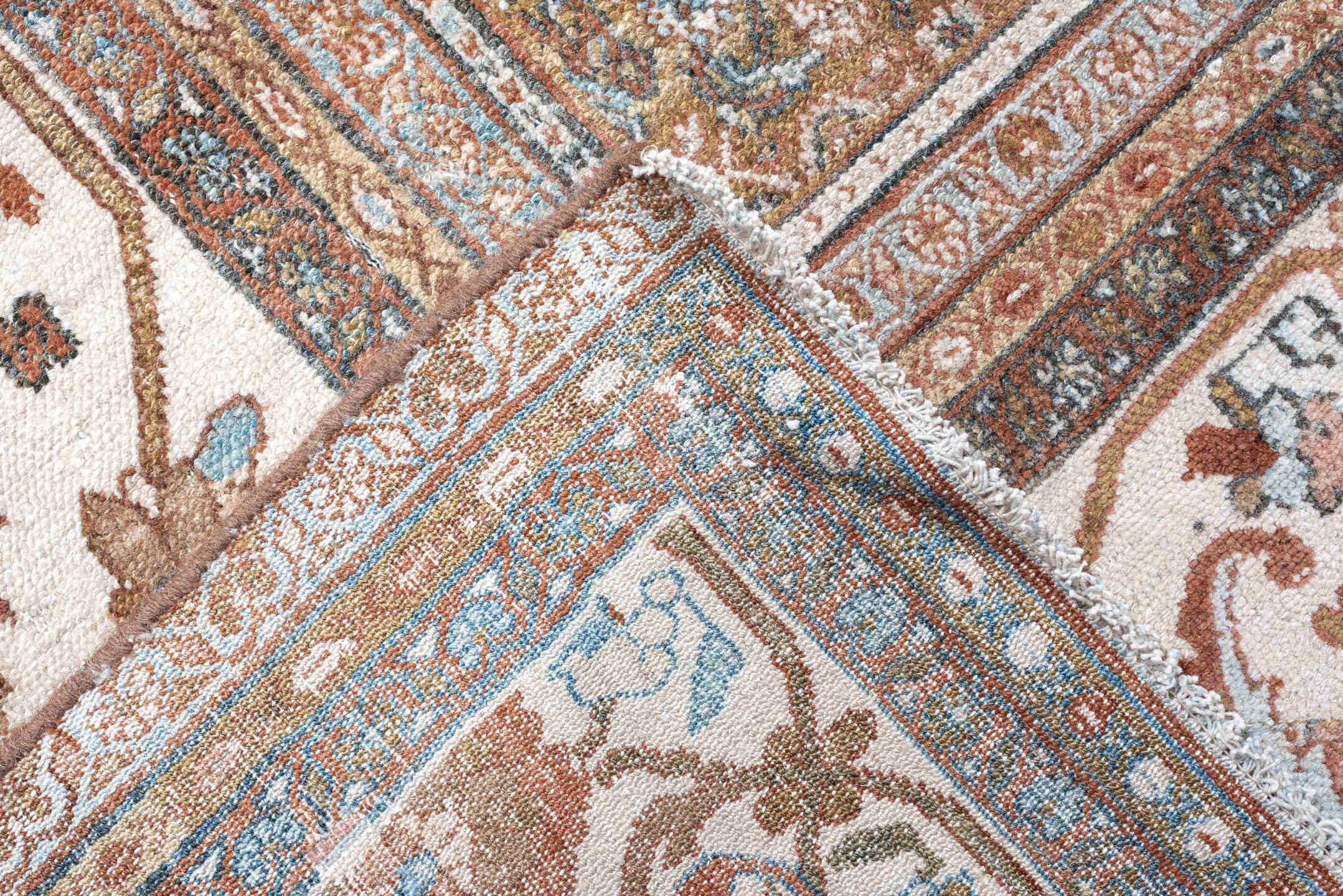 13' x 19' one-of-a-kind handmade antique Bibikabad oversize rug. Color palette: terra cotta, ivory, pale blue, taupe, camel