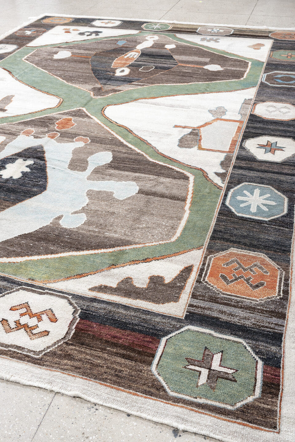 9' x 13' one-of-a-kind handmade vintage Kars large size rug. Color palette: ivory, charcoal, sage, slate, terra cotta