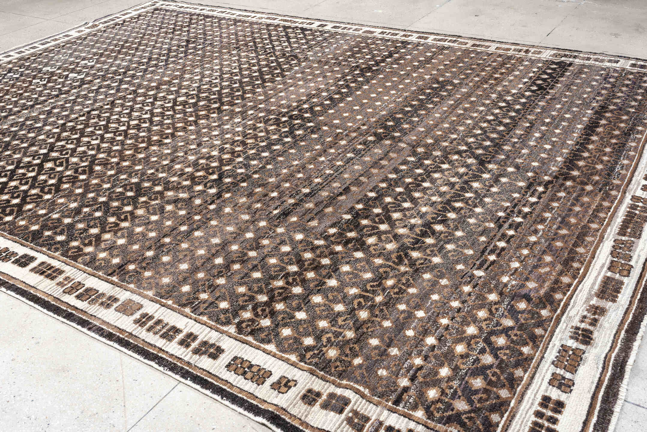 10' x 14' one-of-a-kind handmade vintage Kars oversize rug. Color palette: charcoal, ivory, taupe, brown, camel, gray, black