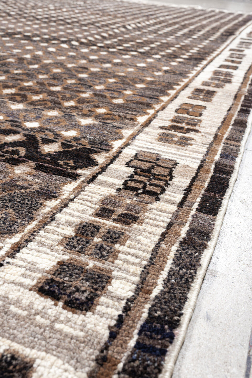 10' x 14' one-of-a-kind handmade vintage Kars oversize rug. Color palette: charcoal, ivory, taupe, brown, camel, gray, black