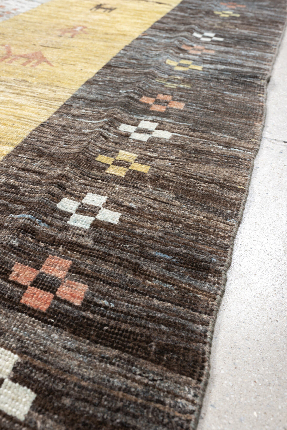 6' x 8' one-of-a-kind handmade antique Gabbe rug. Color palette: gold, charcoal, ivory, camel, coral, slate, sage, rose