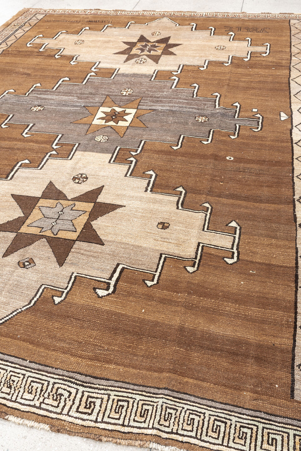 8' x 10' one-of-a-kind handmade antique Kars large size rug. Color palette: camel, ivory, taupe, brown, slate, charcoal