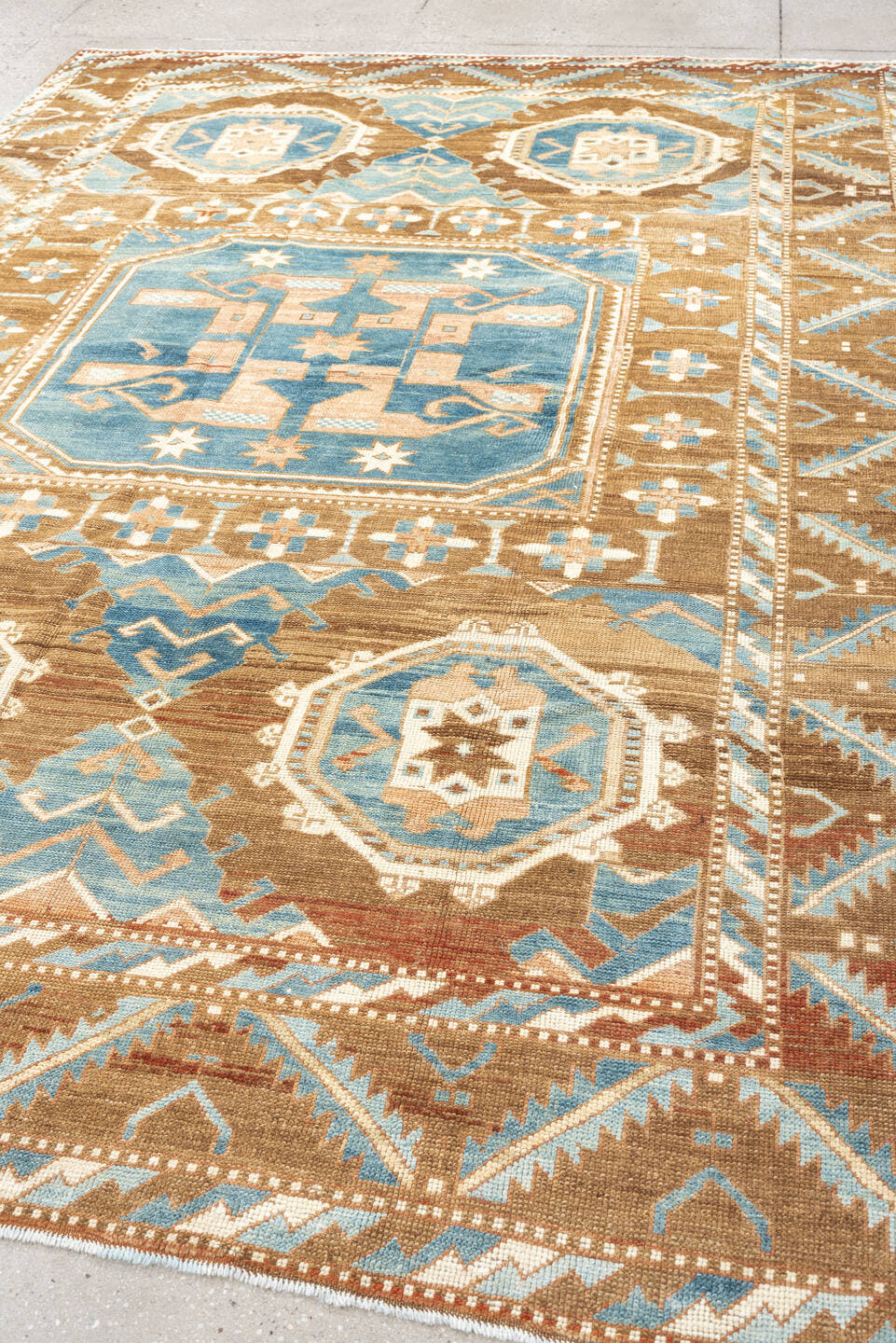 6' x 9' one-of-a-kind handmade antique Kars medium size rug. Color palette: camel, sky blue, ivory, taupe, blush