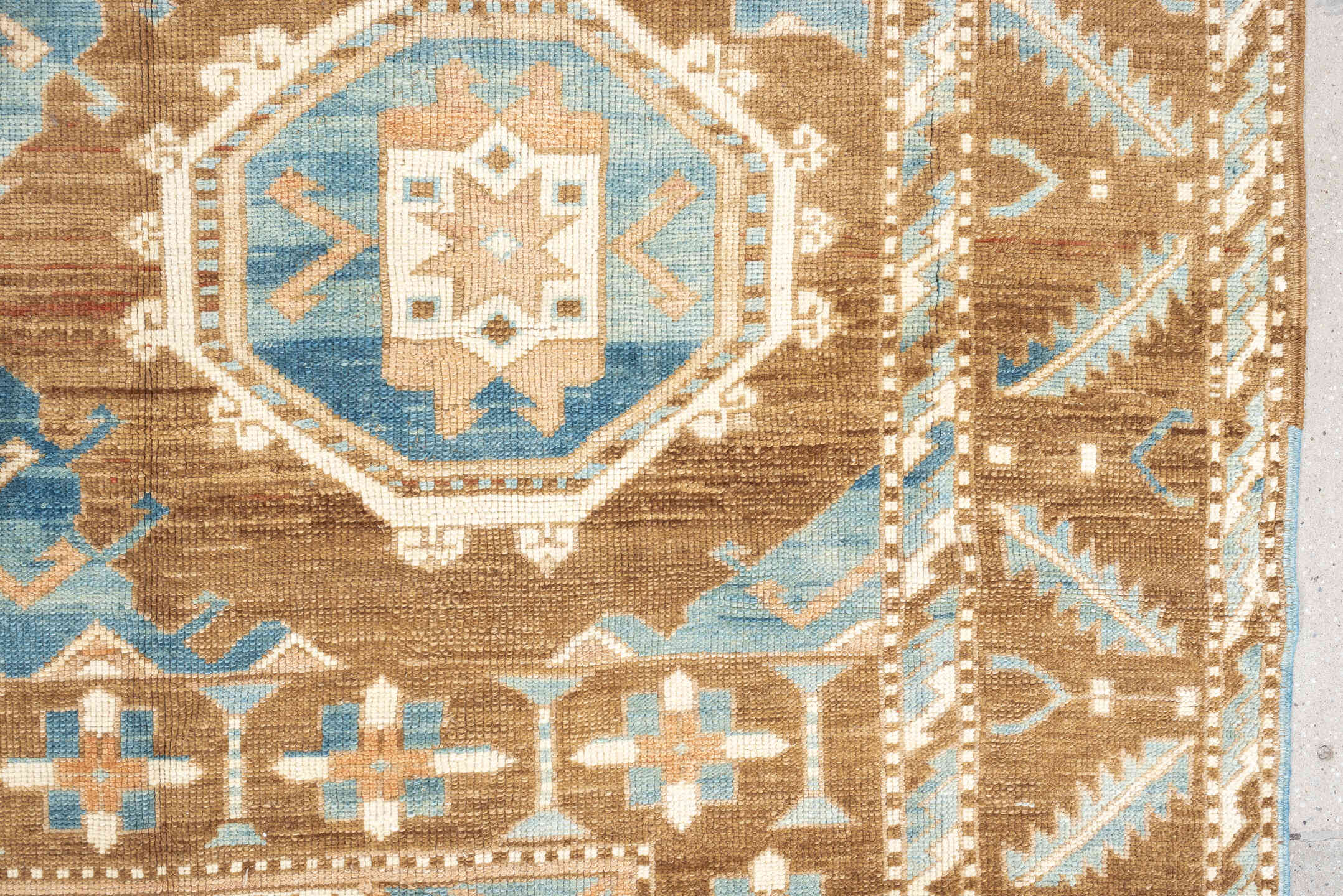 6' x 9' one-of-a-kind handmade antique Kars medium size rug. Color palette: camel, sky blue, ivory, taupe, blush