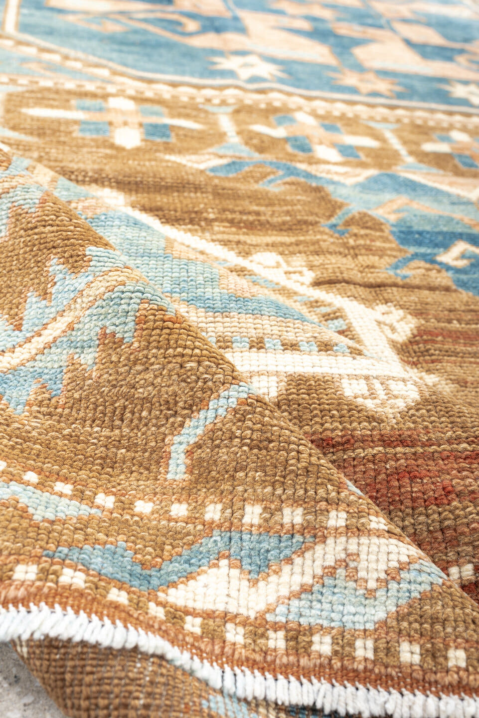 6' x 9' one-of-a-kind handmade antique Kars medium size rug. Color palette: camel, sky blue, ivory, taupe, blush
