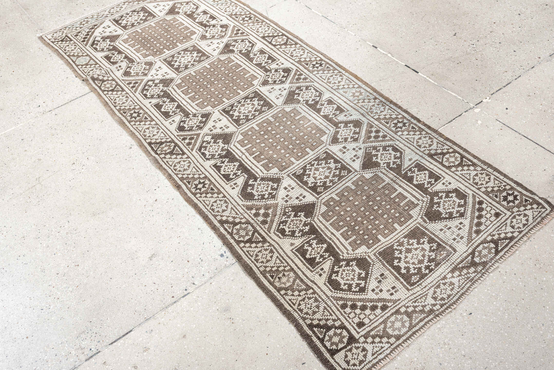 2' x 6' one-of-a-kind handmade antique Anatolian runner rug. Color palette: ivory, taupe, brown, camel, slate, beige, gray