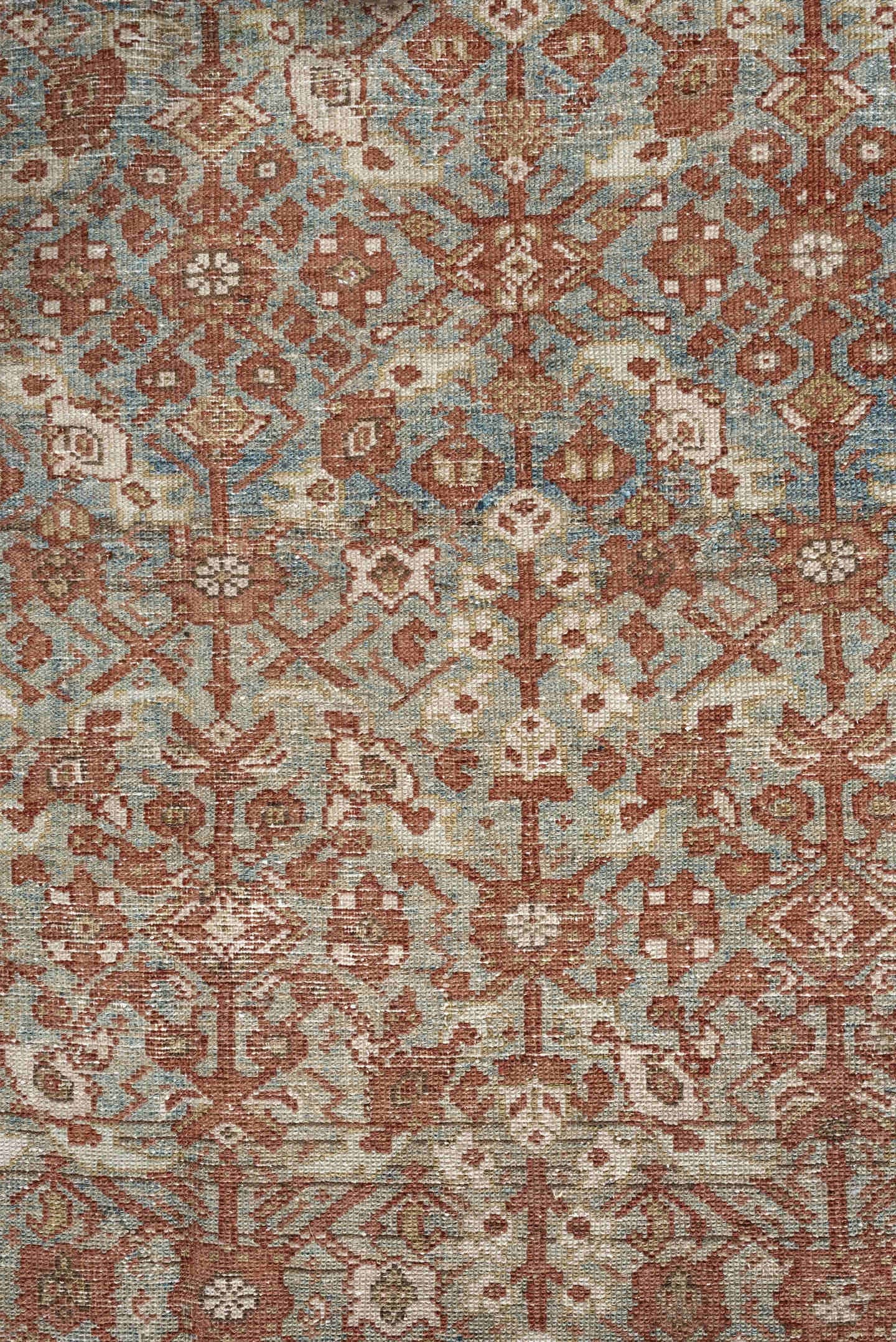 4' x 10' one-of-a-kind handmade antique Malayer runner rug. Color palette: rust, sky blue, ivory, camel, taupe, terracotta