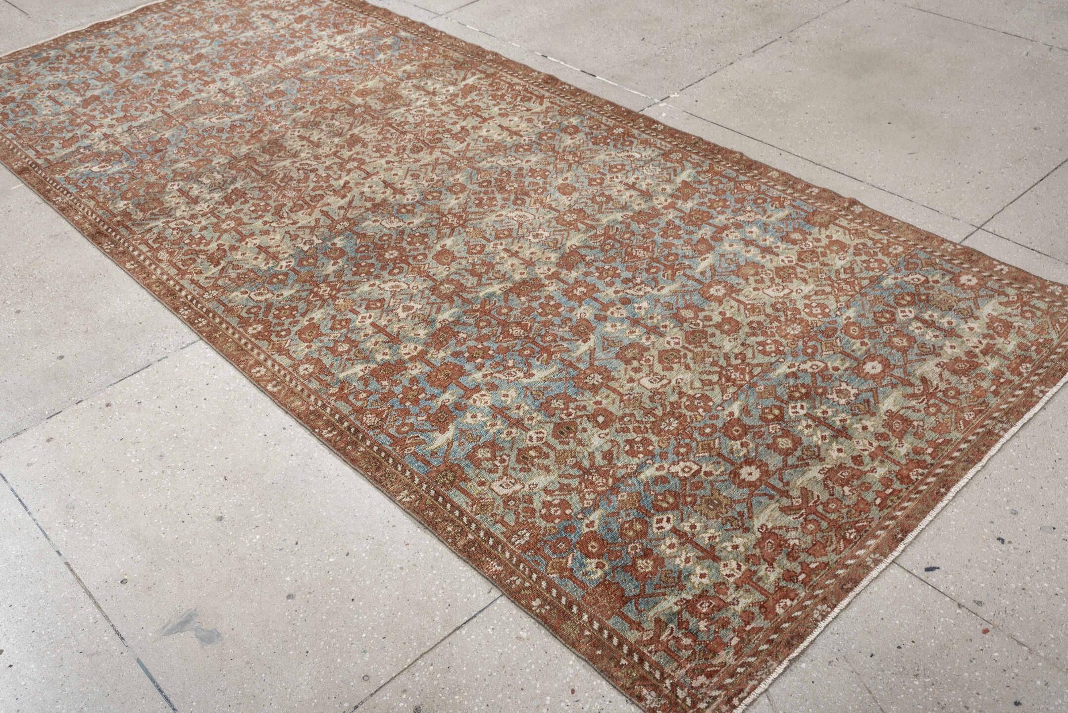 4' x 10' one-of-a-kind handmade antique Malayer runner rug. Color palette: rust, sky blue, ivory, camel, taupe, terracotta
