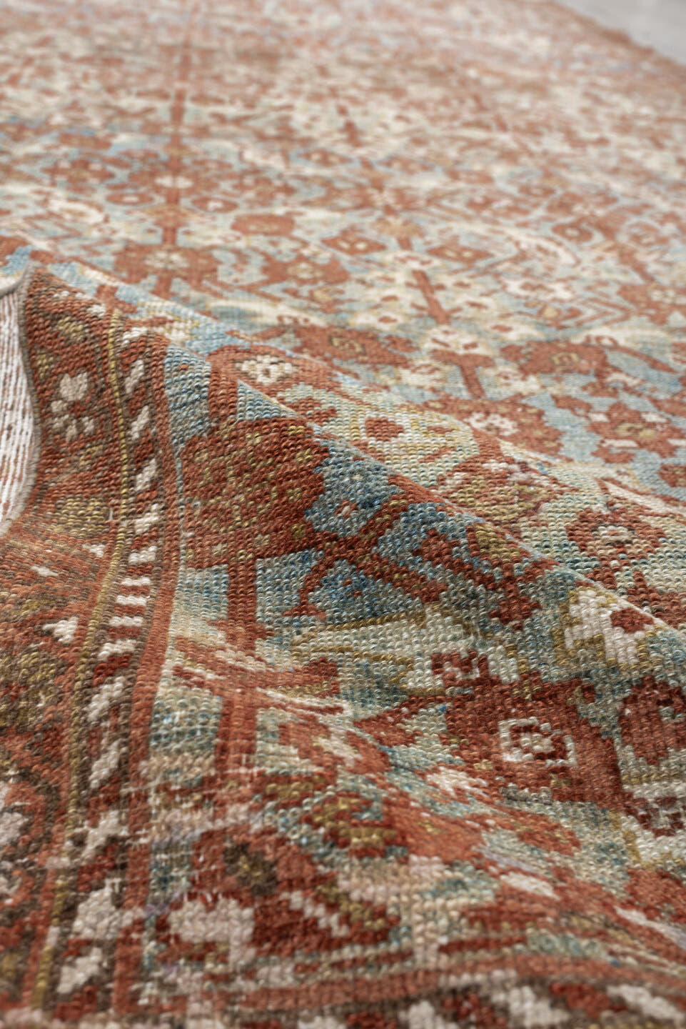 4' x 10' one-of-a-kind handmade antique Malayer runner rug. Color palette: rust, sky blue, ivory, camel, taupe, terracotta