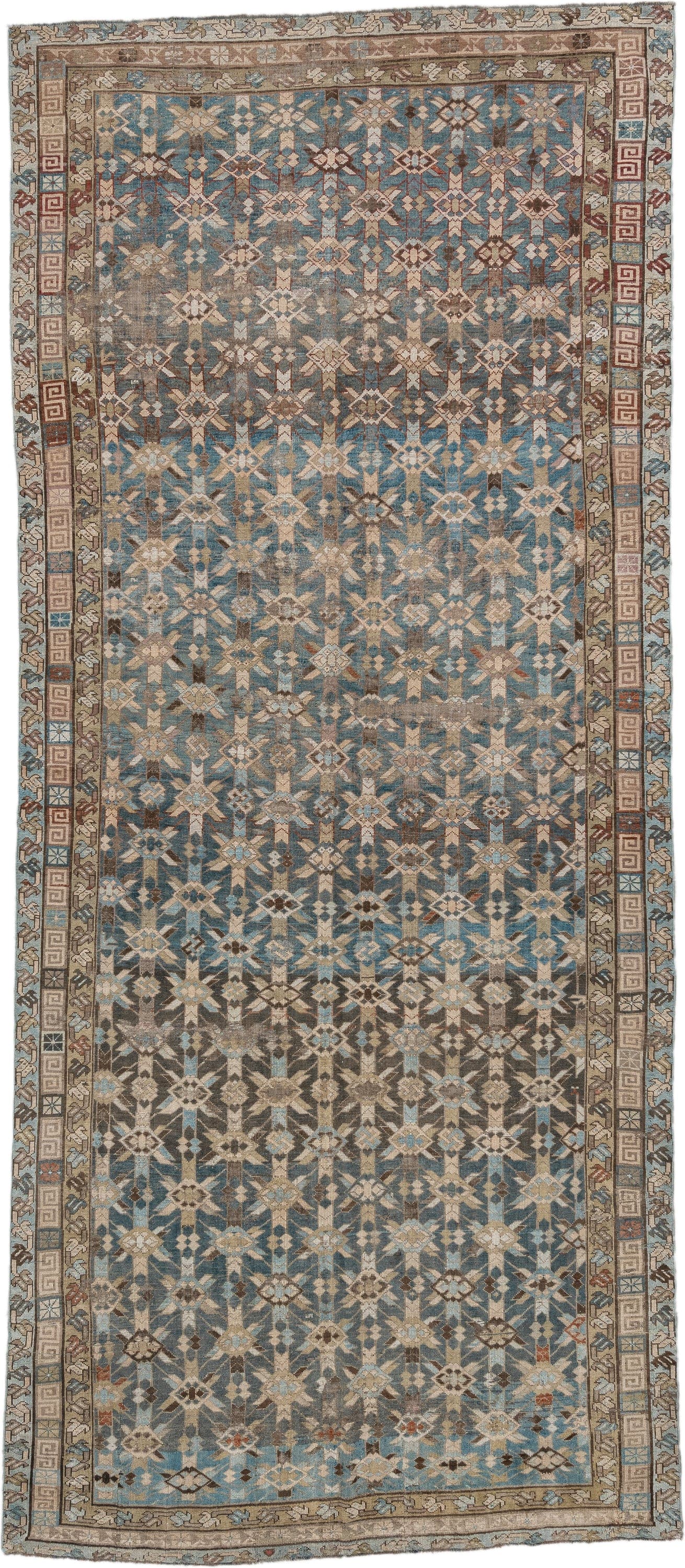 5' x 12' one-of-a-kind handmade antique Kurd rug. Color palette: sky blue, taupe, ivory, brown, beige, rust, light blue
