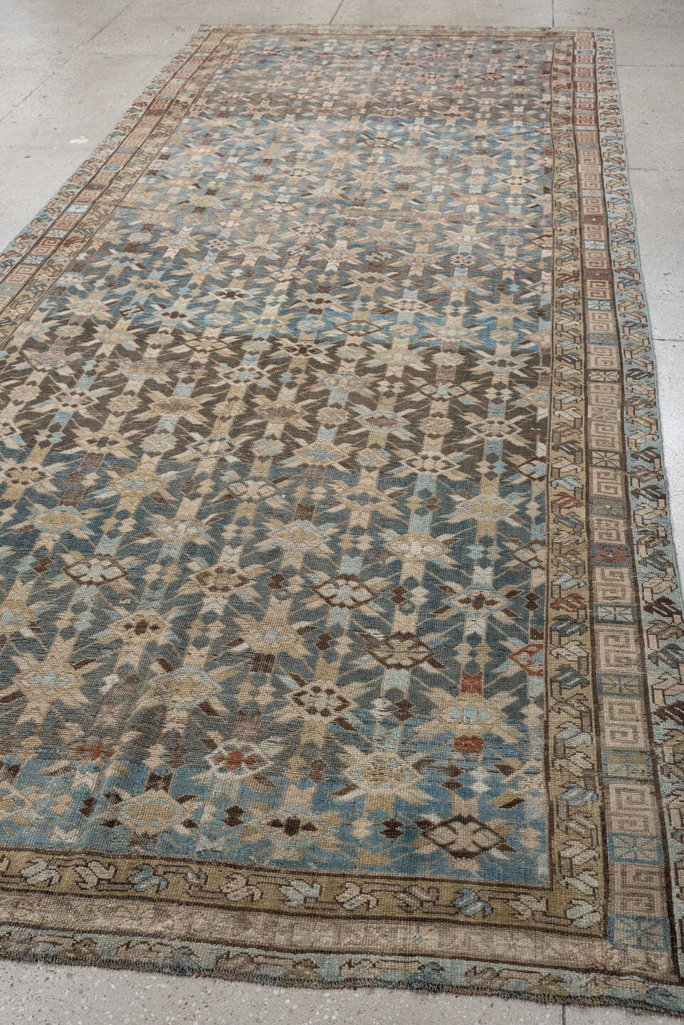 5' x 12' one-of-a-kind handmade antique Kurd rug. Color palette: sky blue, taupe, ivory, brown, beige, rust, light blue