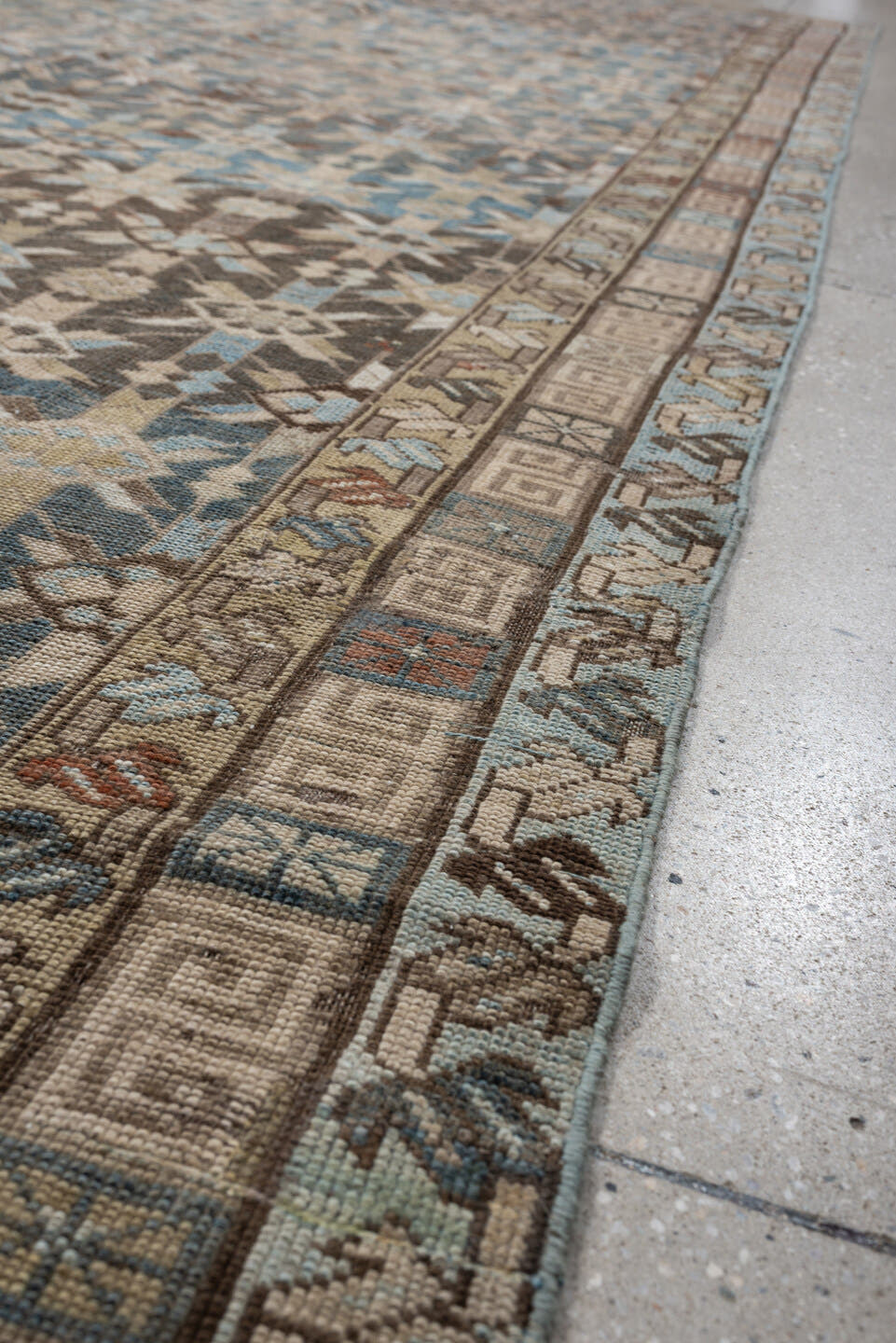 5' x 12' one-of-a-kind handmade antique Kurd rug. Color palette: sky blue, taupe, ivory, brown, beige, rust, light blue