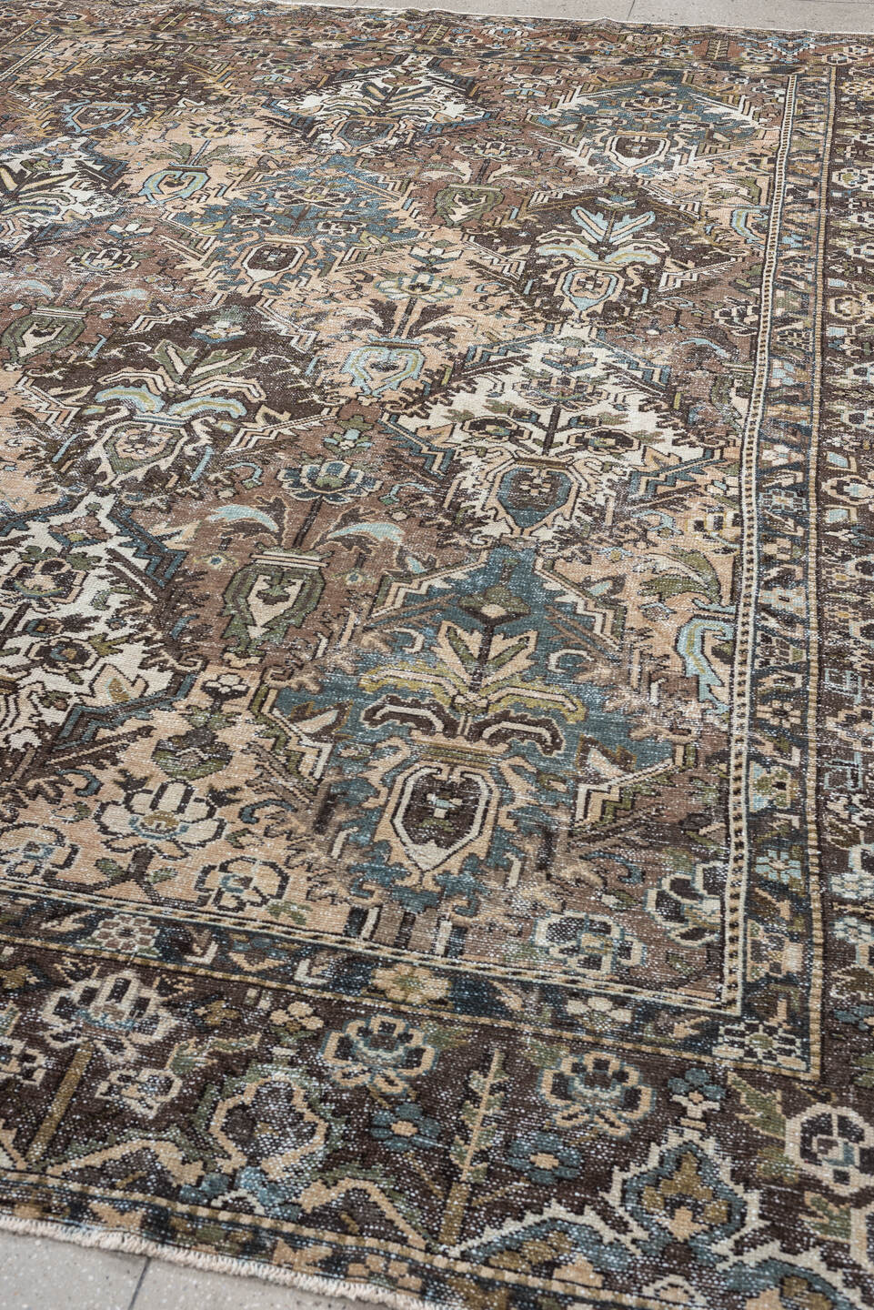 10' x 13' one-of-a-kind handmade antique Baktiary oversize rug. Color palette: brown, taupe, sky blue, ivory, sage, charcoal