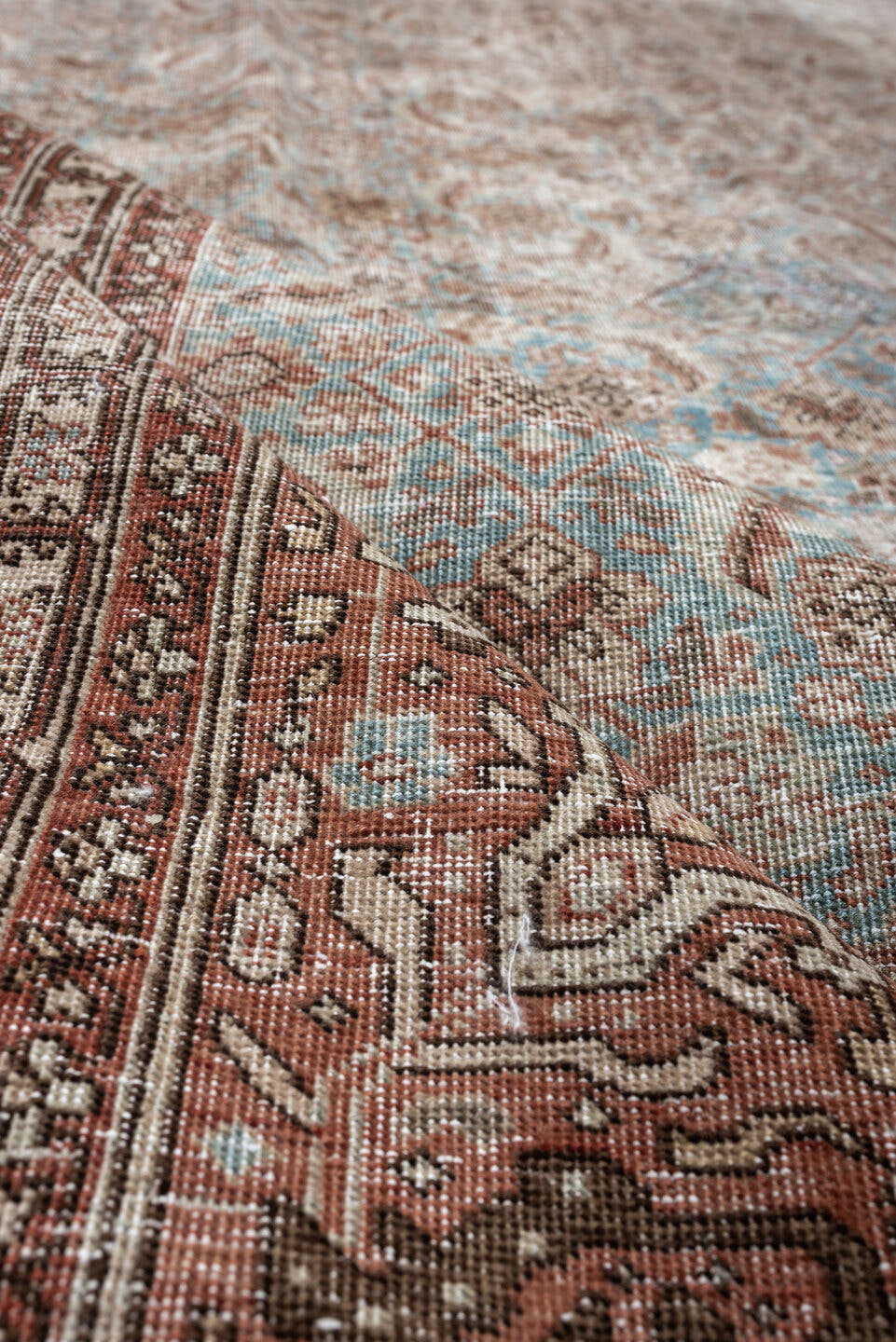 9' x 11' one-of-a-kind handmade antique Tabriz large size rug. Color palette: terracotta, pale blue, ivory, taupe, brown