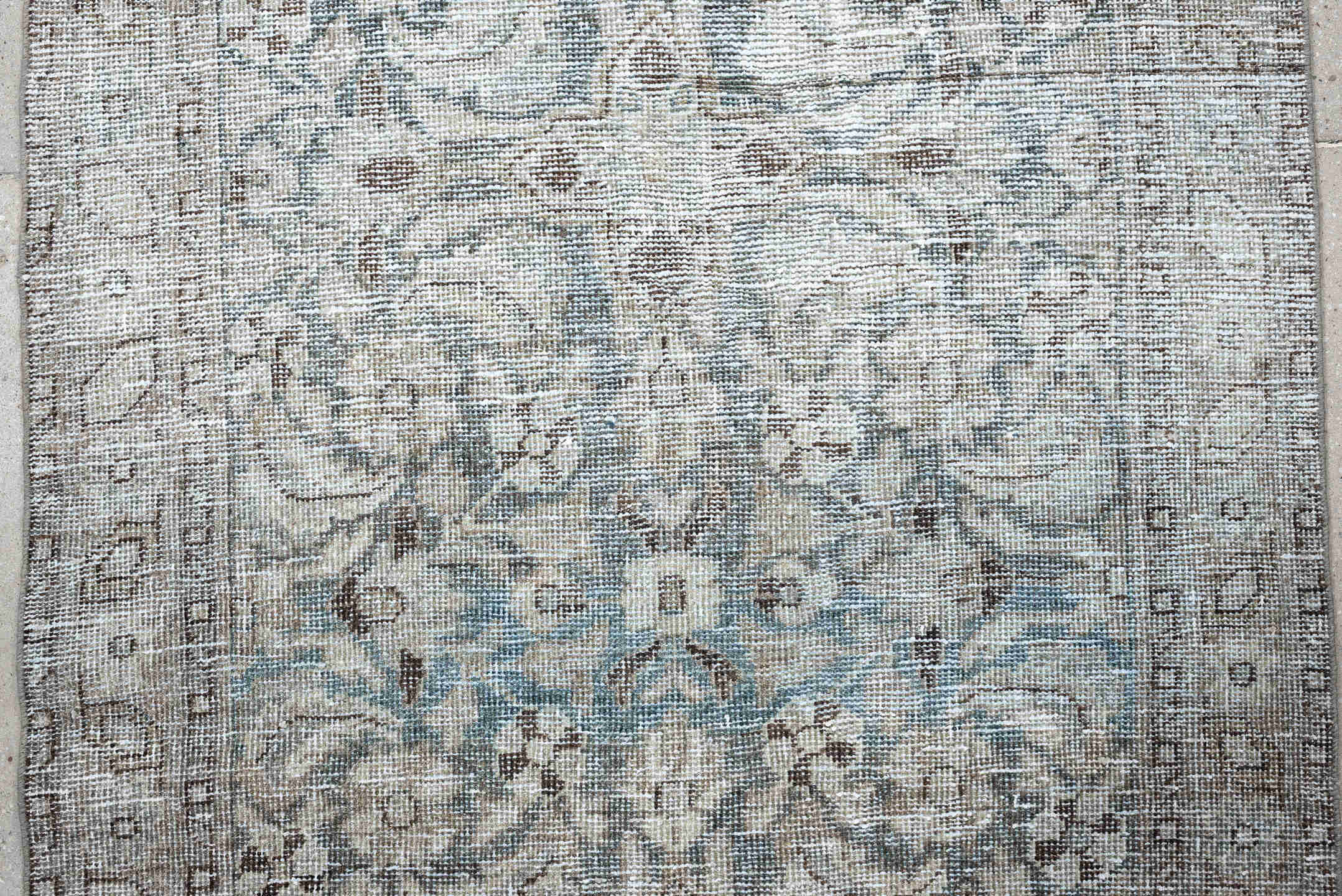 3' x 9' one-of-a-kind handmade antique Mahal runner rug. Color palette: ivory, taupe, pale blue, gray, brown, beige