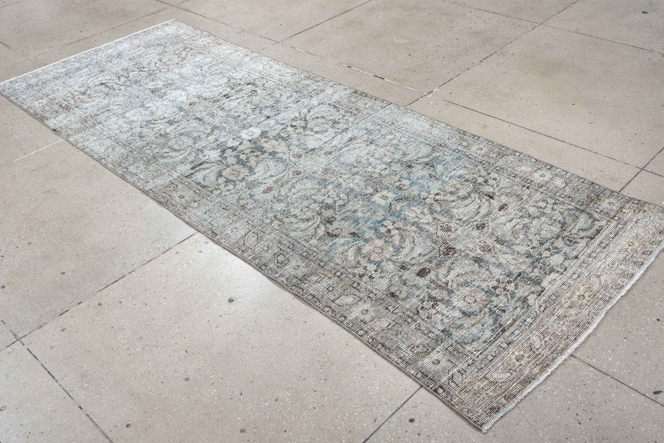 3' x 9' one-of-a-kind handmade antique Mahal runner rug. Color palette: ivory, taupe, pale blue, gray, brown, beige