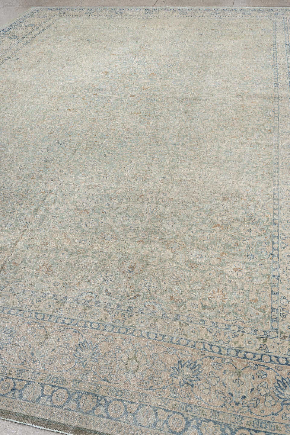 11' x 15' one-of-a-kind handmade antique Tabriz oversize rug. Color palette: ivory, pale blue, sky blue, cream, taupe