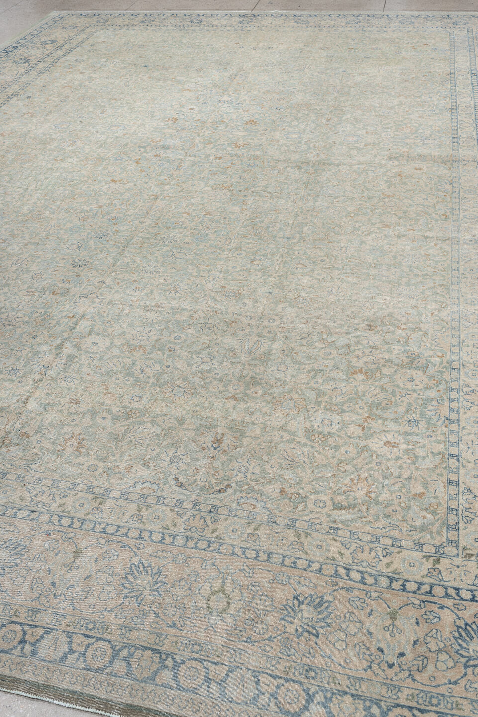11' x 15' one-of-a-kind handmade antique Tabriz oversize rug. Color palette: ivory, pale blue, sky blue, cream, taupe