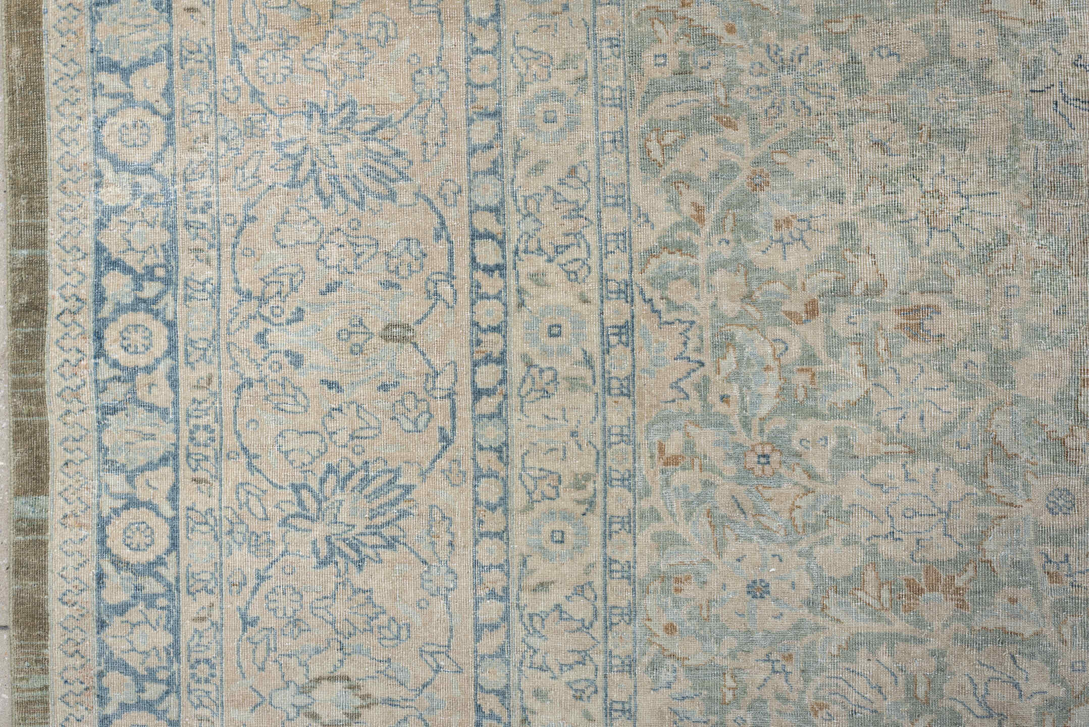 11' x 15' one-of-a-kind handmade antique Tabriz oversize rug. Color palette: ivory, pale blue, sky blue, cream, taupe
