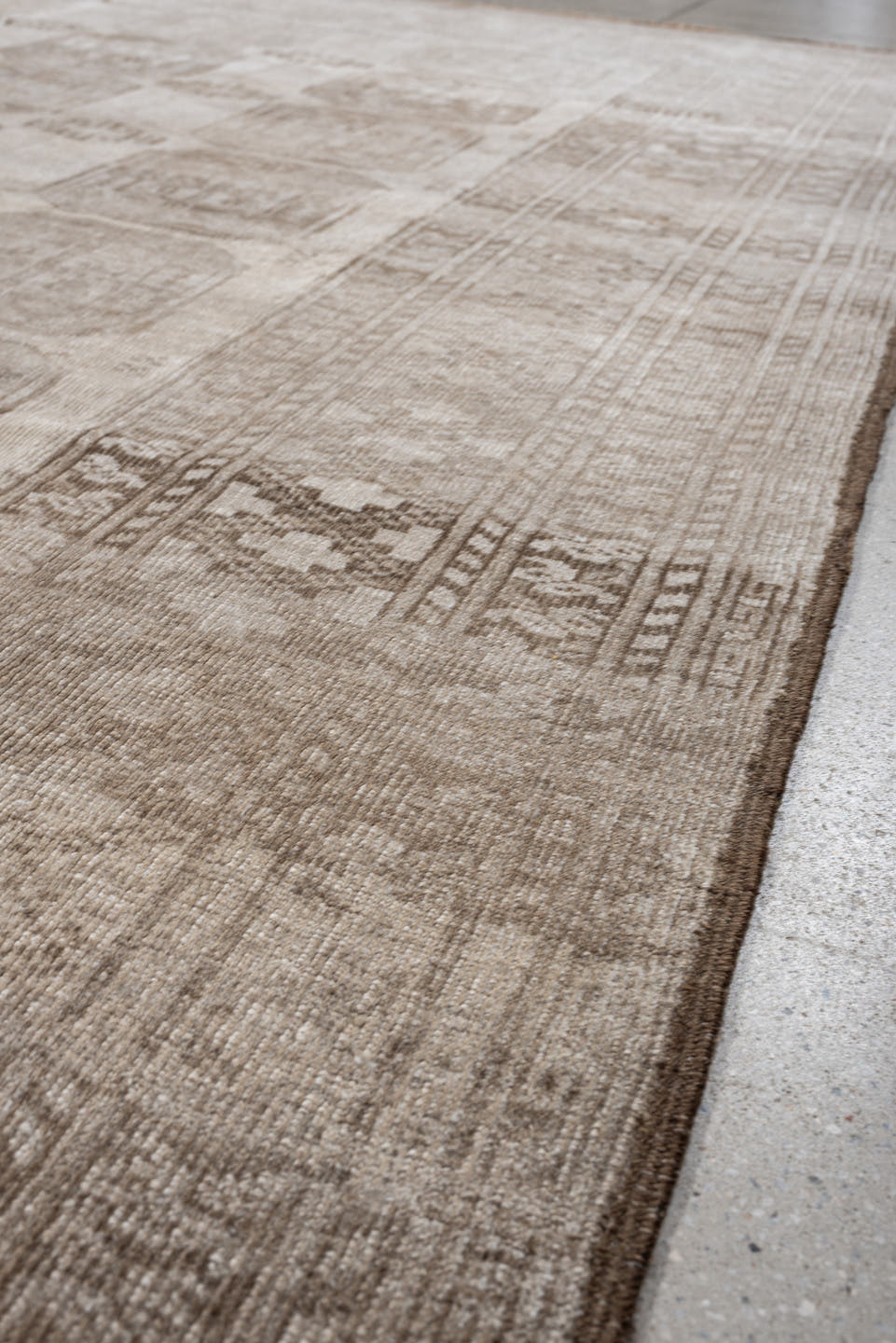 7' x 10' one-of-a-kind handmade antique Afghan large size rug. Color palette: taupe, beige, camel, ivory, brown, gray