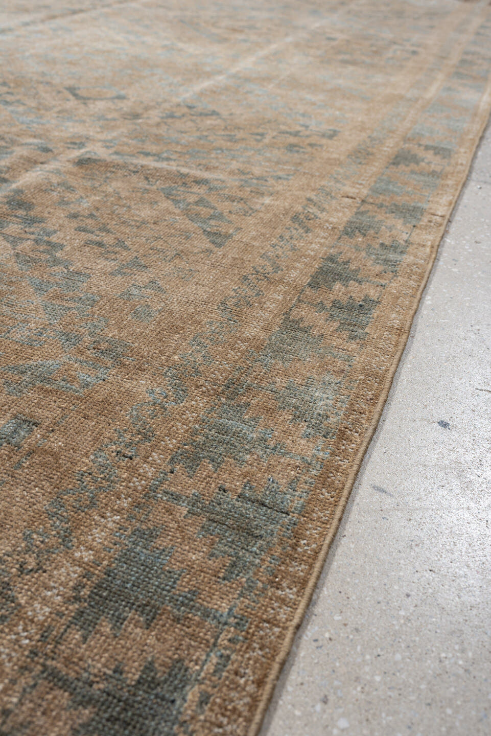 6' x 9' one-of-a-kind handmade antique Belouch large size rug. Color palette: camel, taupe, slate, pale blue, beige, brown