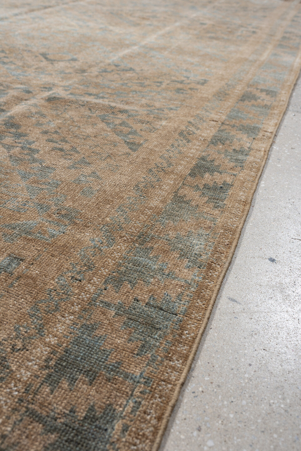 6' x 9' one-of-a-kind handmade antique Belouch large size rug. Color palette: camel, taupe, slate, pale blue, beige, brown
