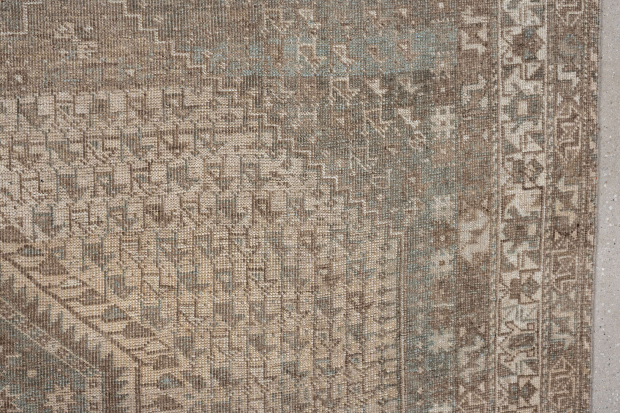 6' x 9' one-of-a-kind handmade antique Shiraz rug. Color palette: taupe, ivory, pale blue, beige, sand, camel, gray